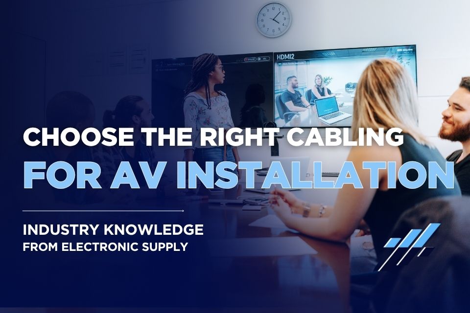 Team in a conference room using AV equipment during a video meeting
