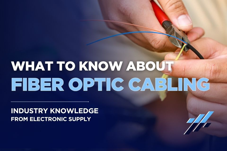 Technician working with fiber optic cabling from Electronic Supply for high-speed commercial network installations